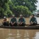 fishermen search for crocodile